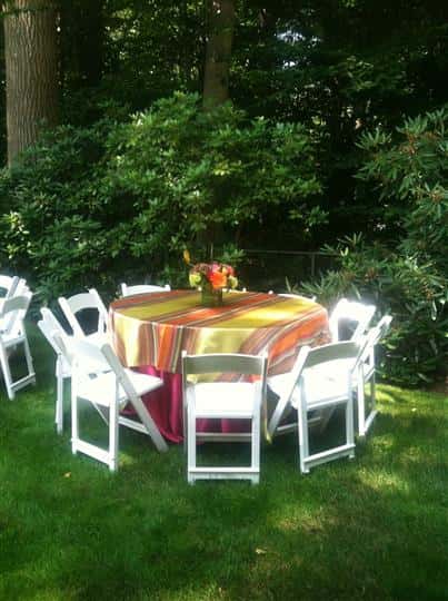 table outside with flowers in the middle