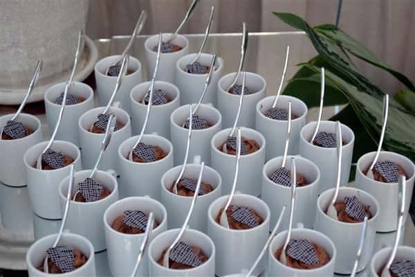 dessert in cups with spoons