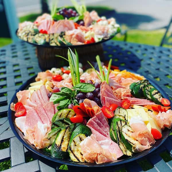 sliced deli meat and vegetable platter