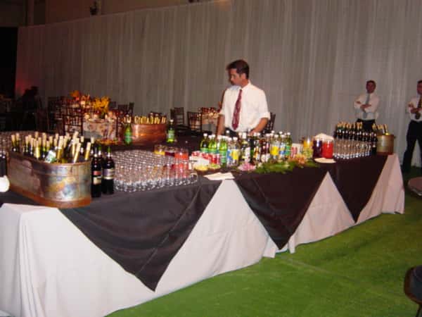 employee behind a catering table