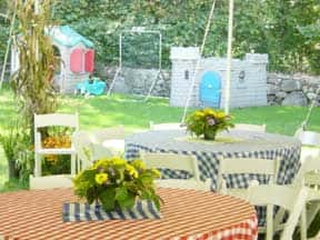 table outside with flowers in the middle