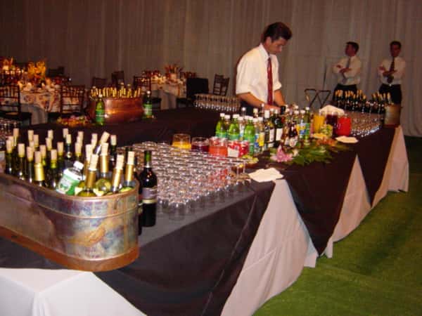 employee behind a catering table