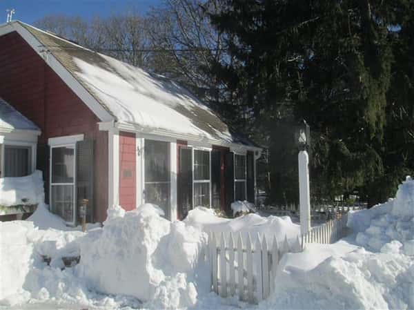 exterior view of Red Cottage Restaurant in the snow