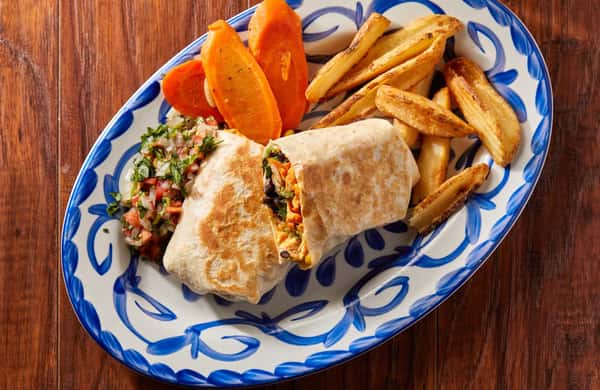 chicken burrito with fries, carrots and pico de gallo on the side.