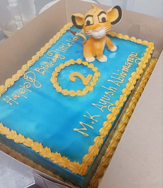 Lion king theme cake from Chennai Cafe