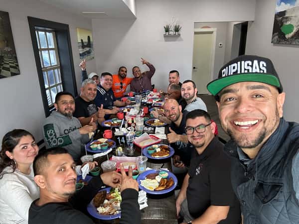 People having lunch at Pupusas