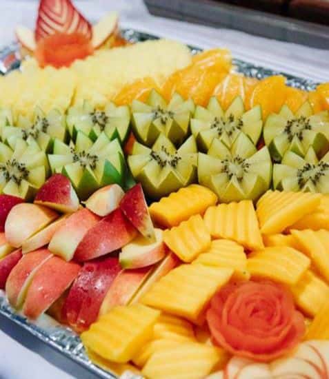 Assorted Fruit: typically grapes, watermelon, pineapple, and more