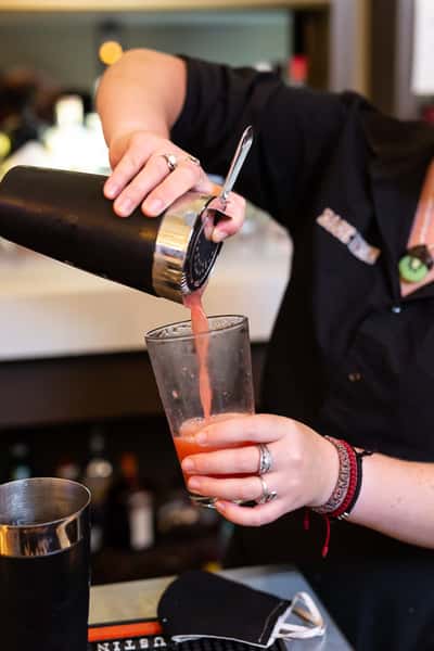 bartender pouring drink