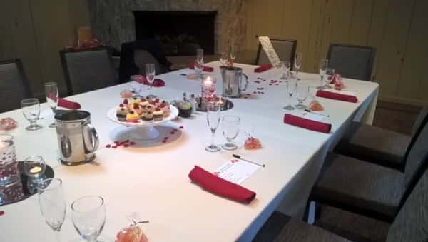 long table set for holiday dinner