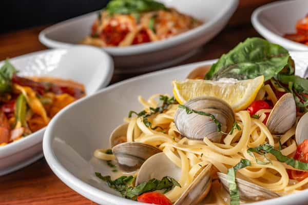 A tempting selection of pasta dishes from 17th Street Grill, capturing the essence of American food with a gourmet twist