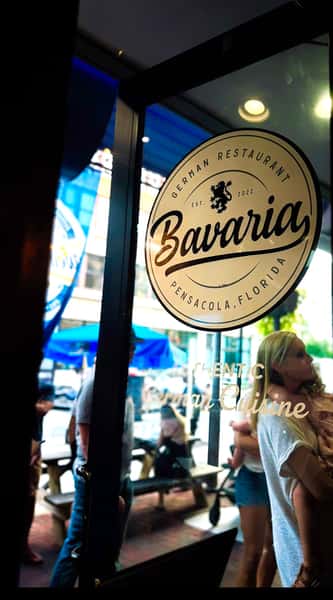 Bavaria restaurant sign displayed on window exterior