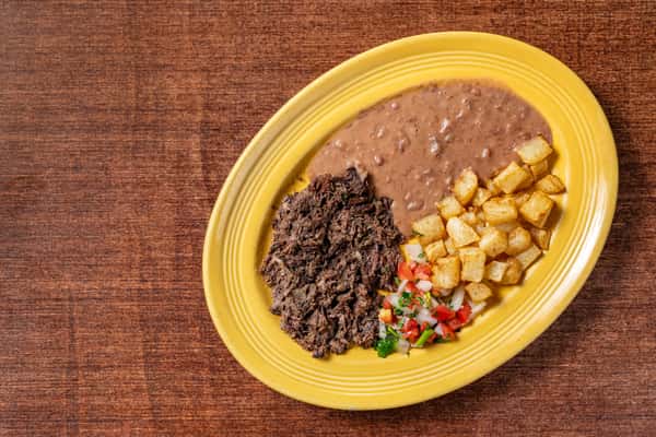 Classic Mexican breakfast platter with shredded beef barbacoa, refried beans, crispy potatoes, and fresh pico de gallo.