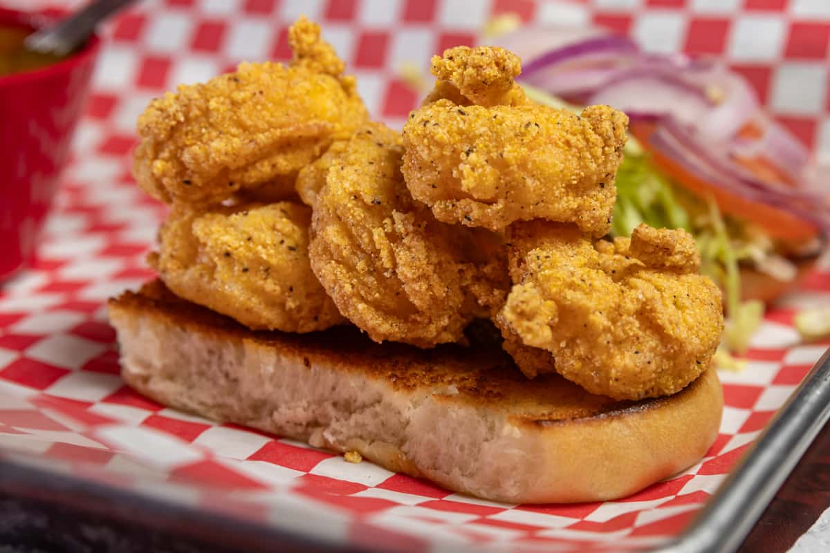 ABU 4601 RD イマエ About - The Big E-Z Crawfish & Oyster Bar - Cajun restaurant in