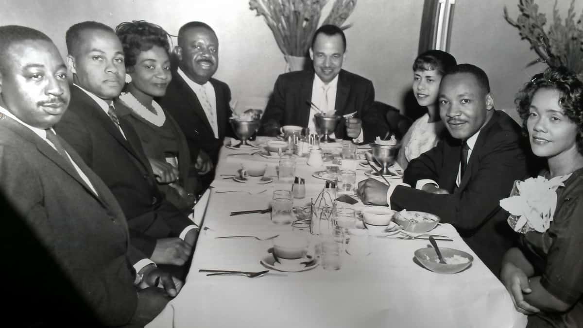 Rev. Fred Bennett, Mr. Isaac Farris, Sr., Mrs. Christine King Farris, Rev. Ralph D. Abernathy, Dr. Roy C. Bell, Mrs. Clarice Wyatt Bell, Dr. Martin Luther King, Jr., Mrs. Coretta Scott King; Pascal’s Restaurant, Hunter St., Atlanta, GA. ~1962 — Photo via Dr. Clarice Bell on Flickr