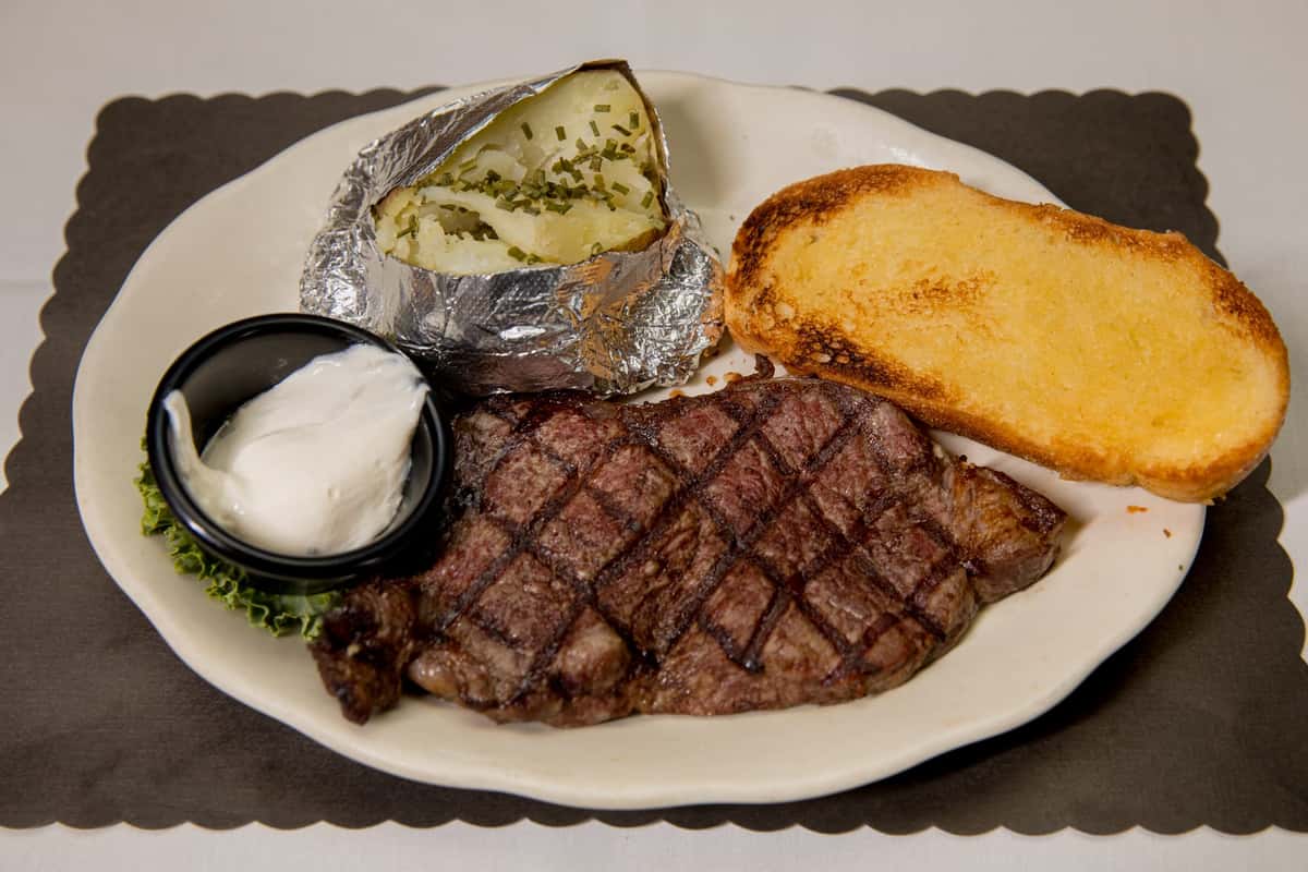 Choice Angus New York Strip Steak 14 Oz - Dinner Menu - Cammaratas Restaurant - Steak House In Lockport Ny