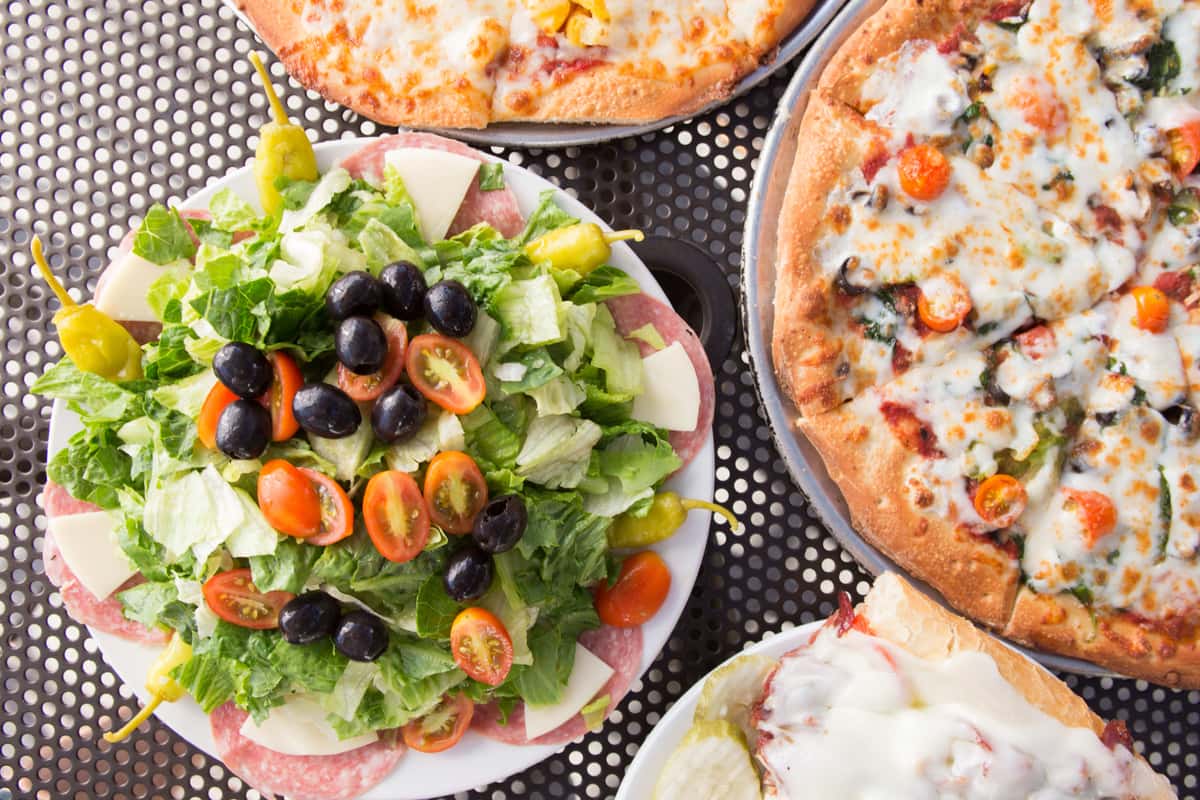 Salad and pizzas