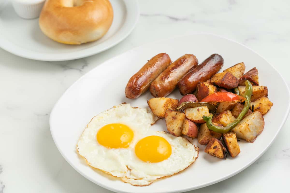 Two Eggs Any Style With Chicken Apple Sausage - The Nosh - Deli in