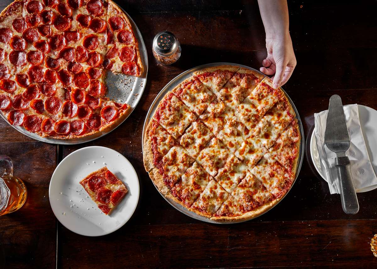 sliced pizza pies