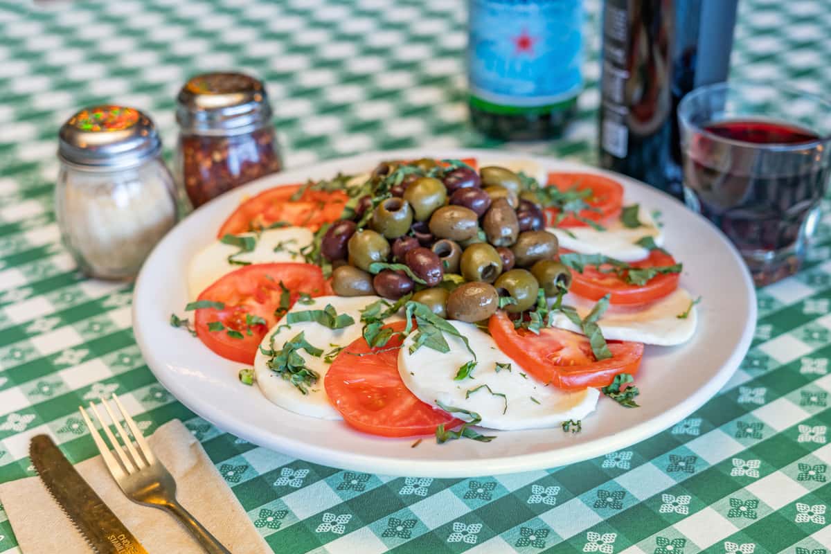 Caprese Salad with Olive Mix - Rocco's Ristorante Pizzeria - Pizza