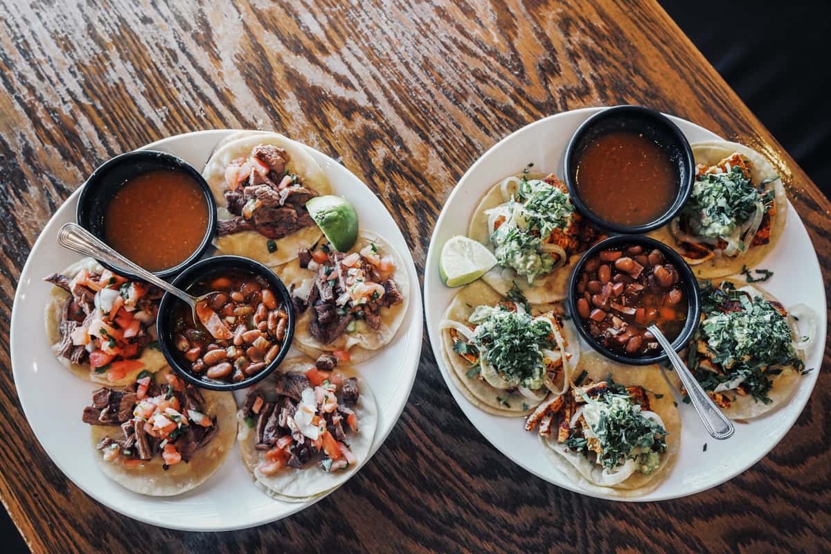 two plates of tacos