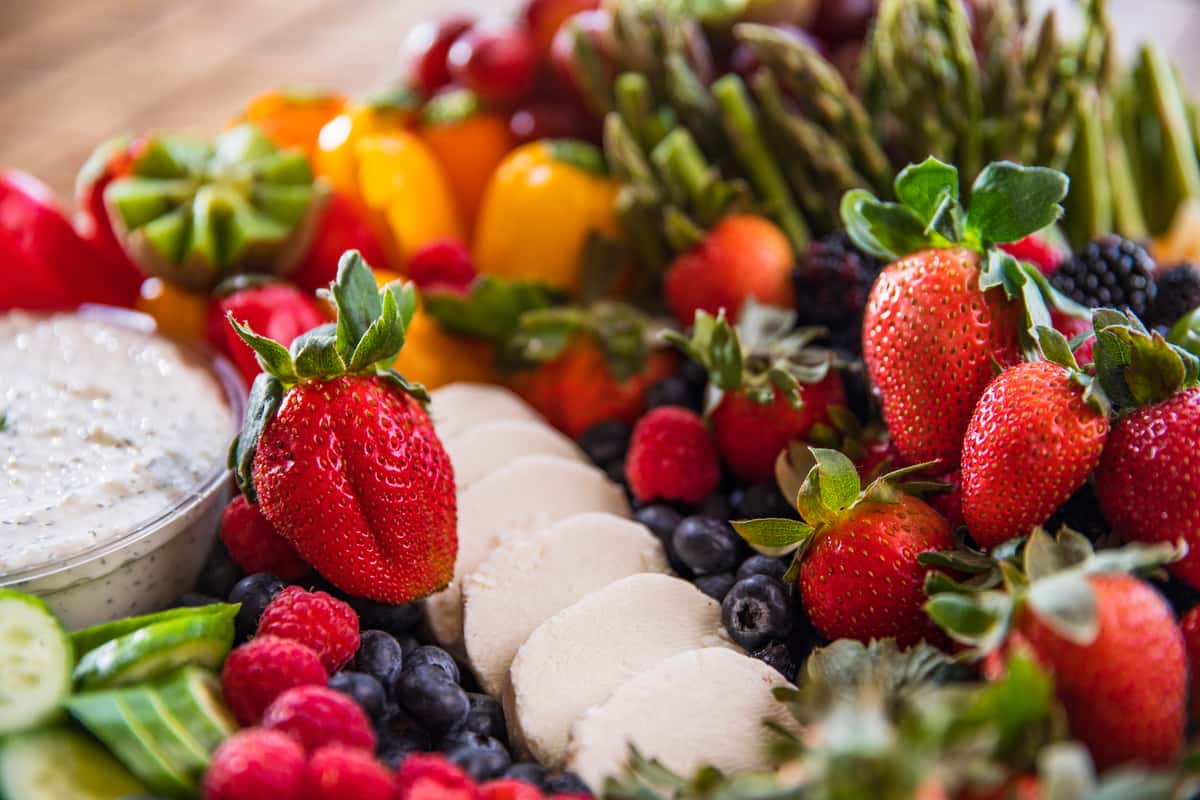 Various fruits, vegetables and dips