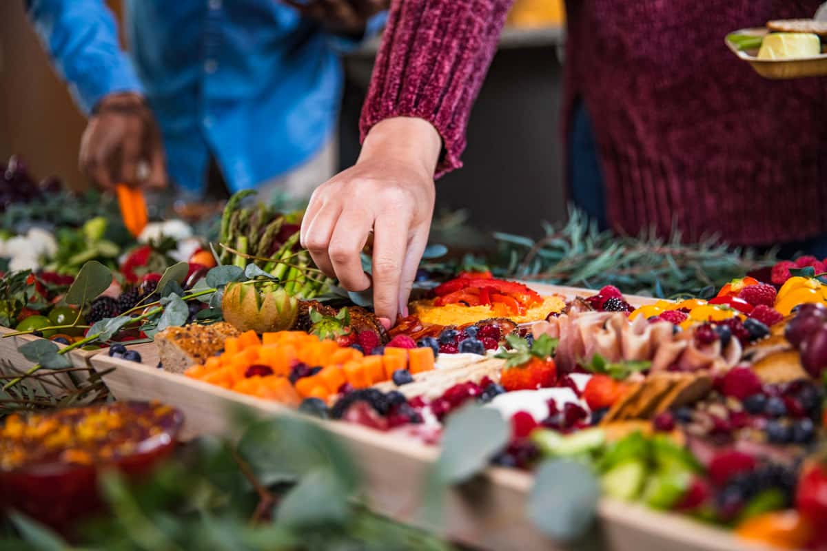 Guests dining from a charcuterie board