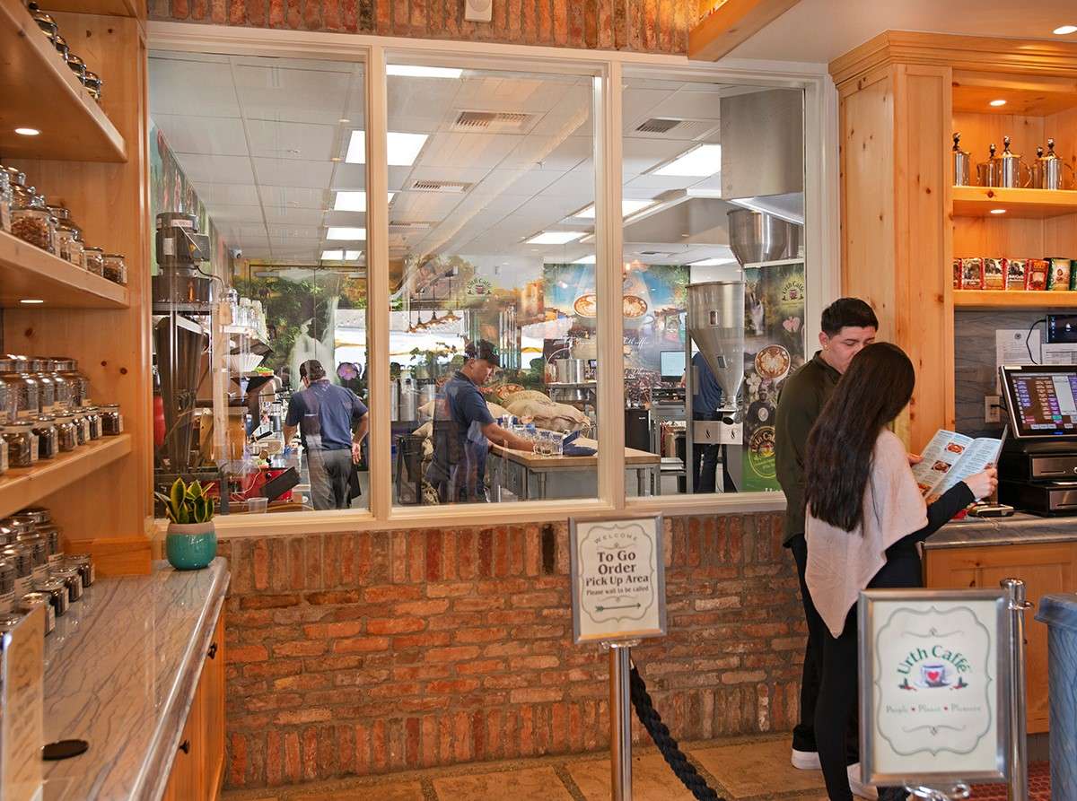 Lobby window at Urth South Bay allows guests to look inside coffee roasting department