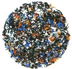 Loose leaf tea with blue and orange flower petals and green leaves