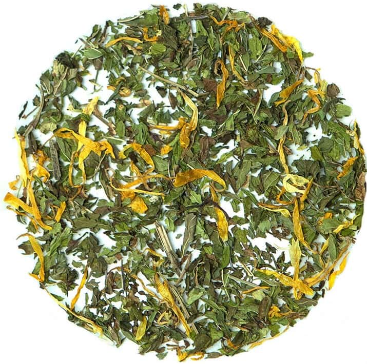 Loose leaf tea green leaves and yellow flower petals