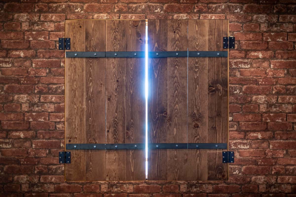 Door with a sliver of light shining through