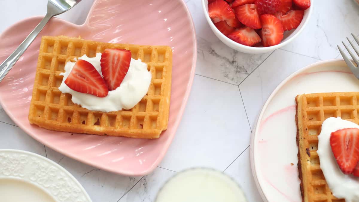 Waffles with strawberries and whipped cream