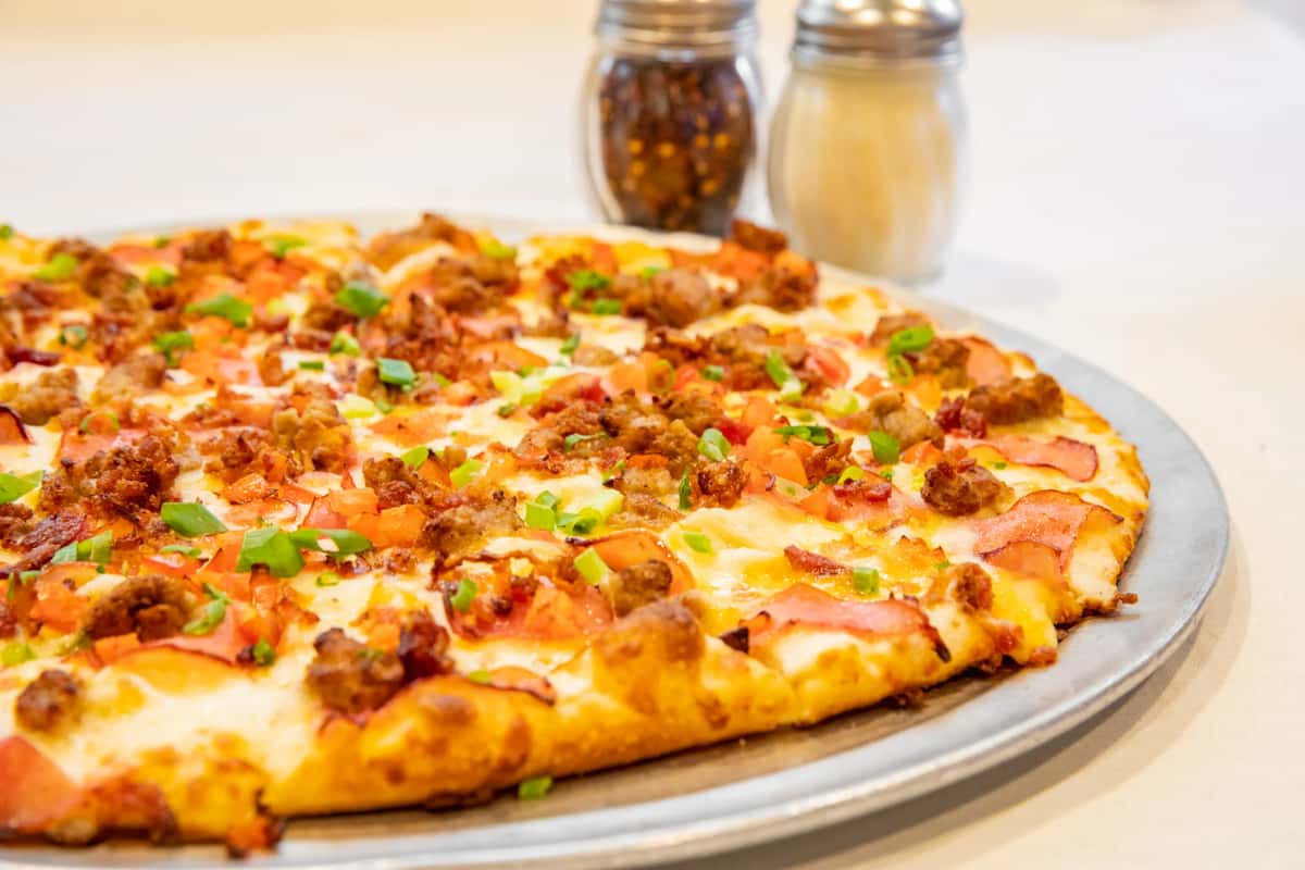 Hearty Bacon Supreme - Round Table Pizza - Hilton Hawaiian Village