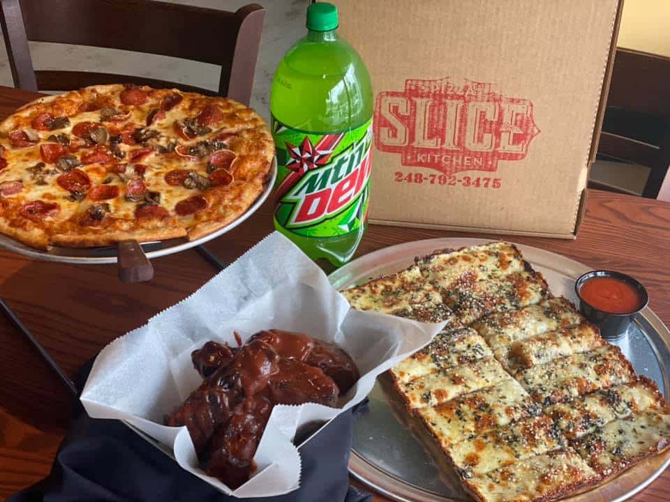pizza, cheese bread, and wings