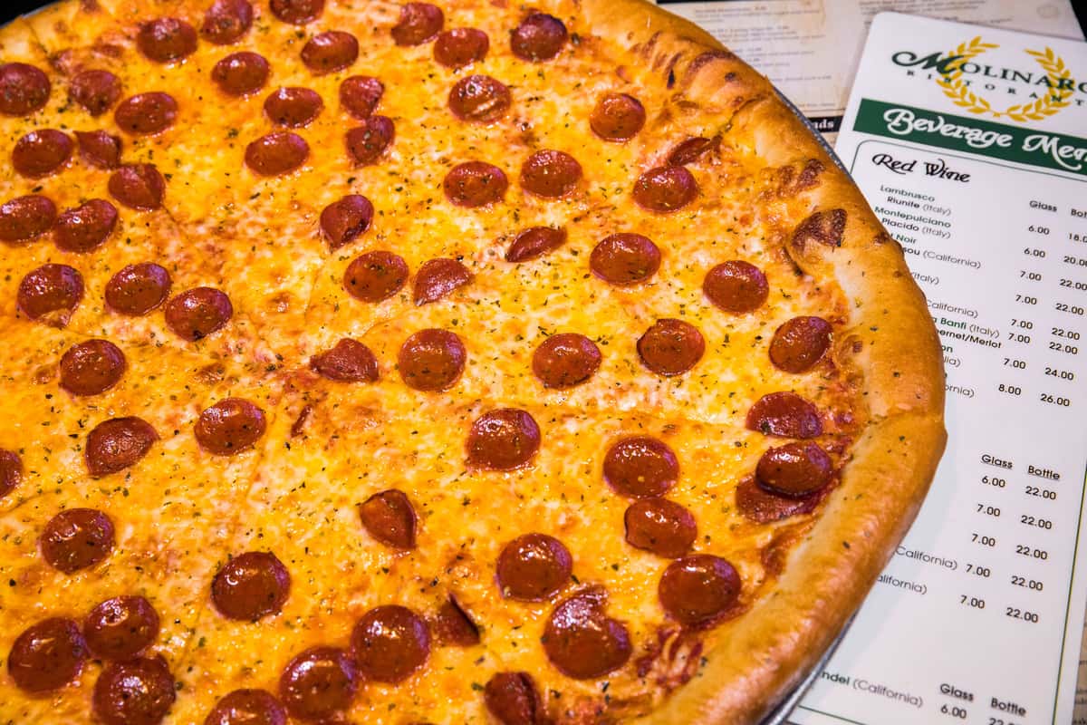Order NY Cheese Pizza food online from Molinaro's Ristorante store, Lockport on bringmethat.com