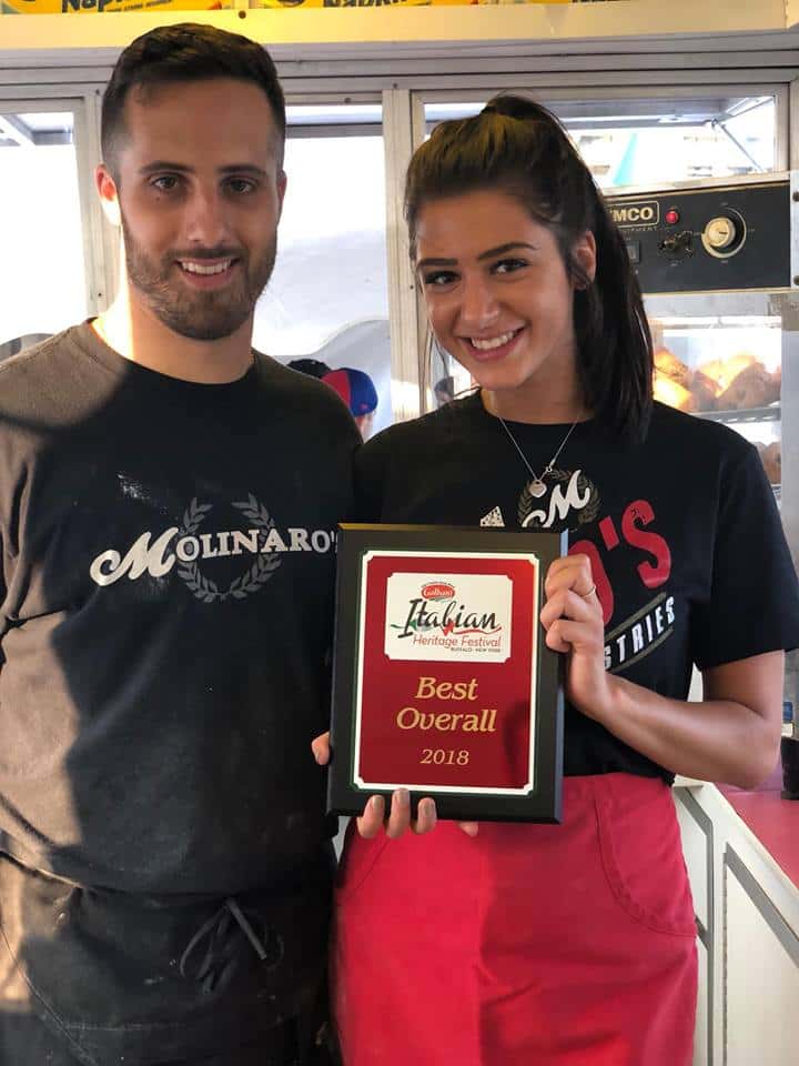 Two Molinaro's employees with award for Best Overall Dish at the Italian Heritage Festival in 2018.