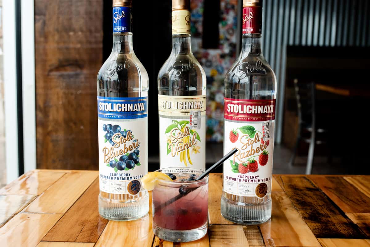liquor bottles and custom cocktail