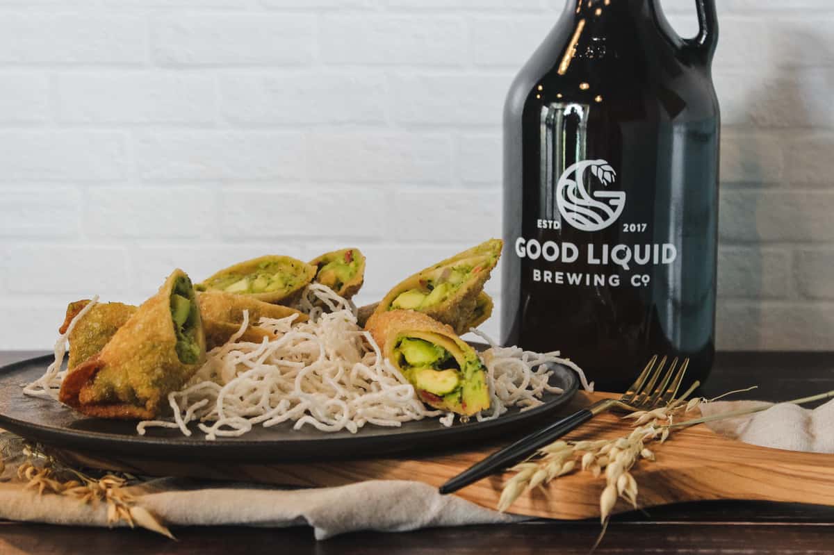 egg rolls with noodles and beer