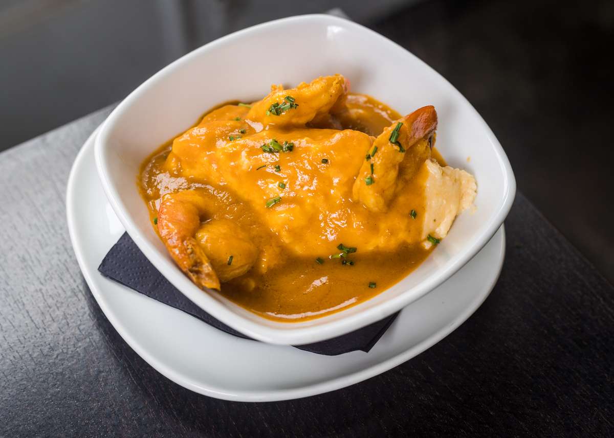 Cheddar Jalapeno Grits w/ Blackened Shrimp & Lobster Gumbo Sauce