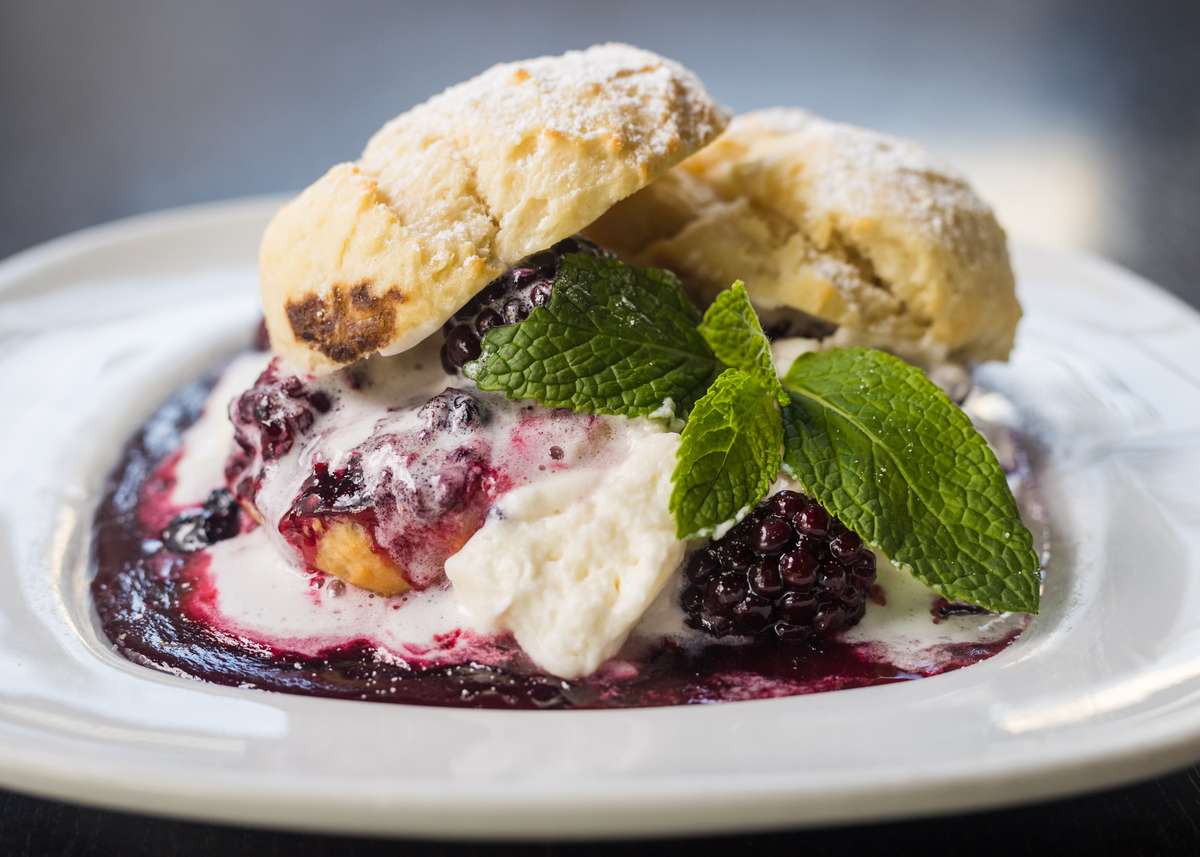 Jumbleberry Shortcake w/ Warm Buttermilk Biscuit, Fresh Whip Cream & Powdered Sugar