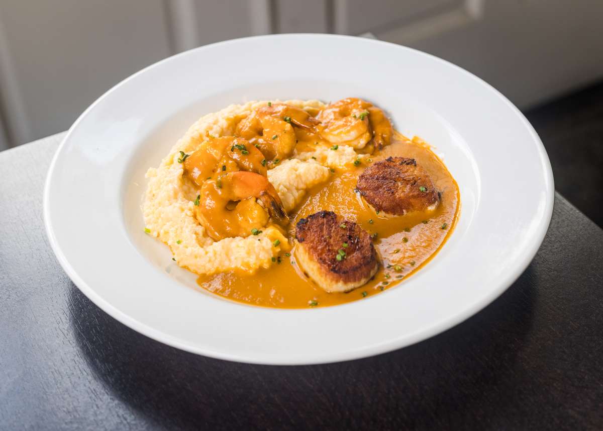 Pan Seared Diver Scallops & Blackened Shrimp w/ Cheddar Jalapeno Grits & Lobster Gumbo Sauce