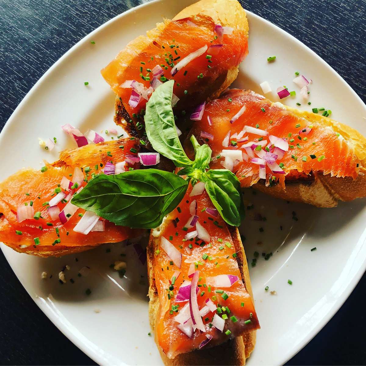 Smoked Salmon Toast Points with Goat Cheese, Red Onions, and Chives