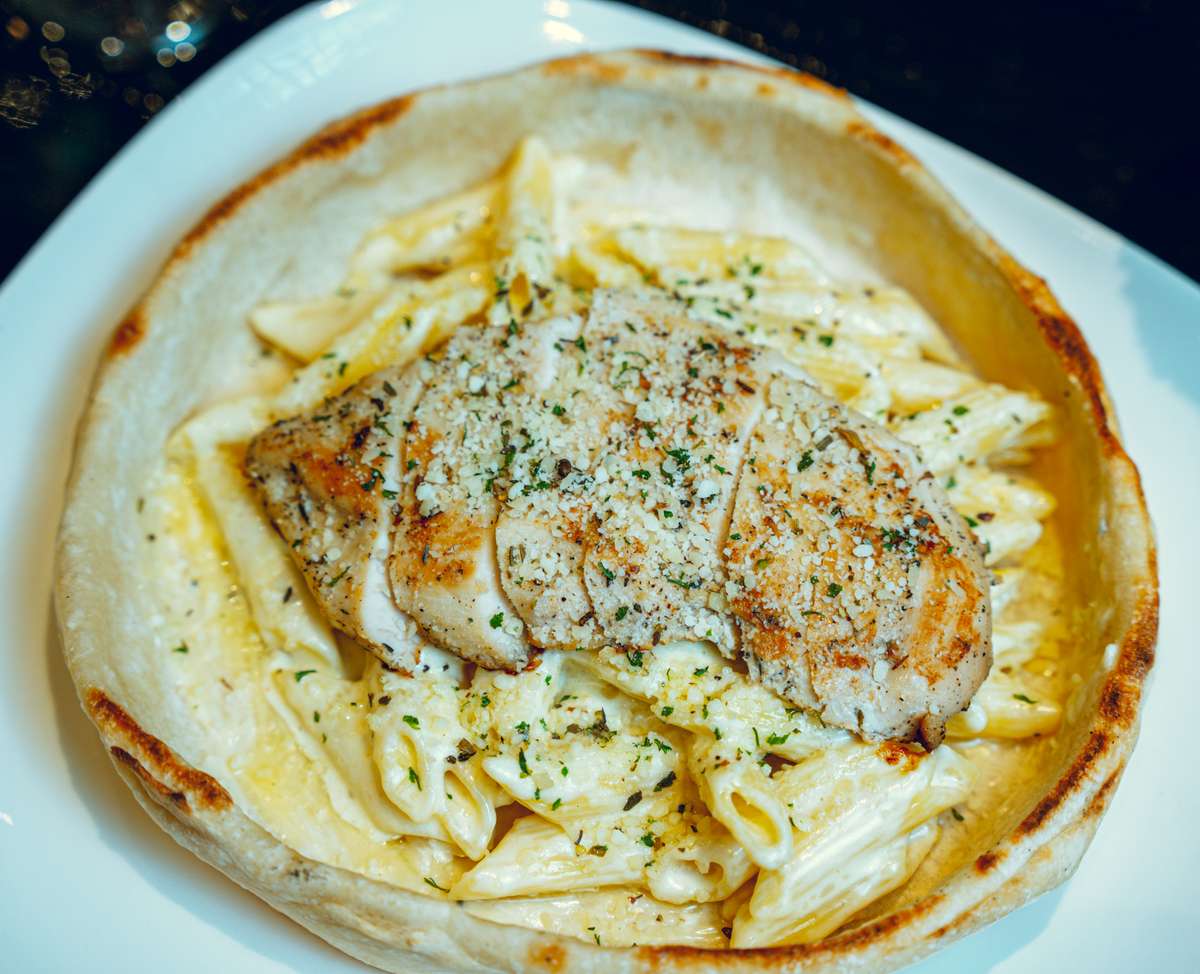 Penne Grilled Chicken and Alfredo Bowl - Mama Romanos | Authentic