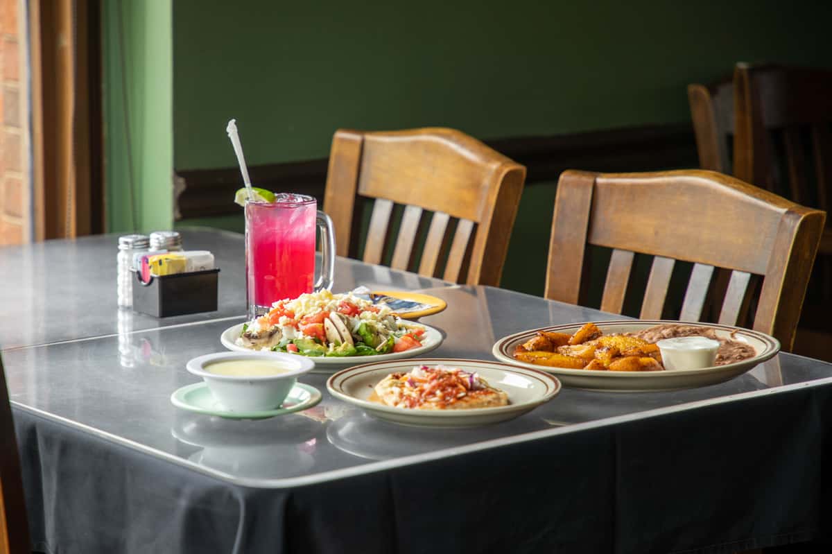 Variety of meals plated at a table