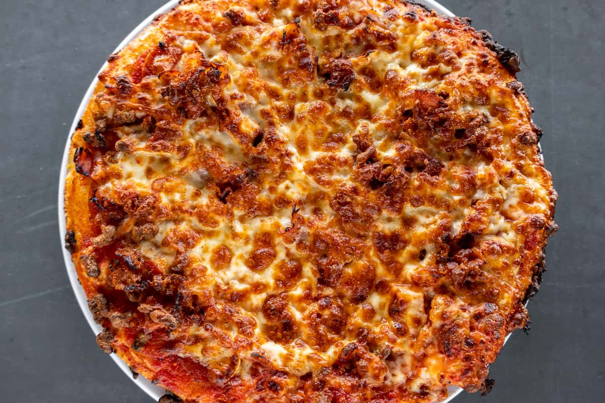 Mega Meat Lovers Pizza - Mancino's Pizza & Grinders