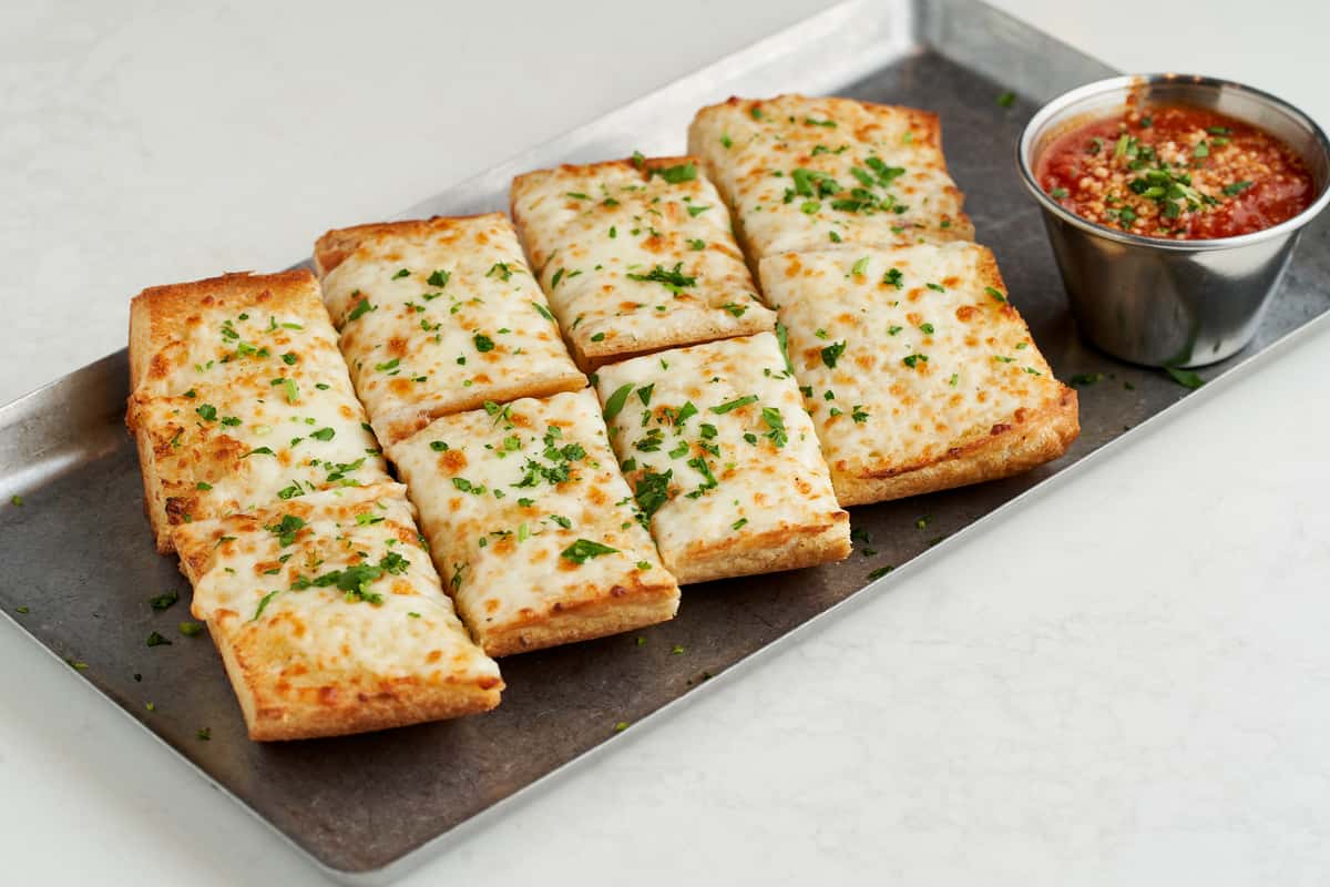 CHEESY GARLIC BREAD WITH MARINARA Menu Spinato's Pizzeria and