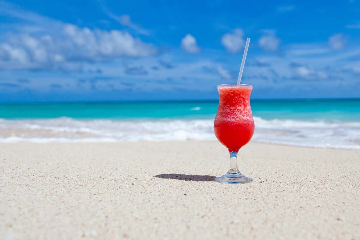 Blended drink on sandy beach
