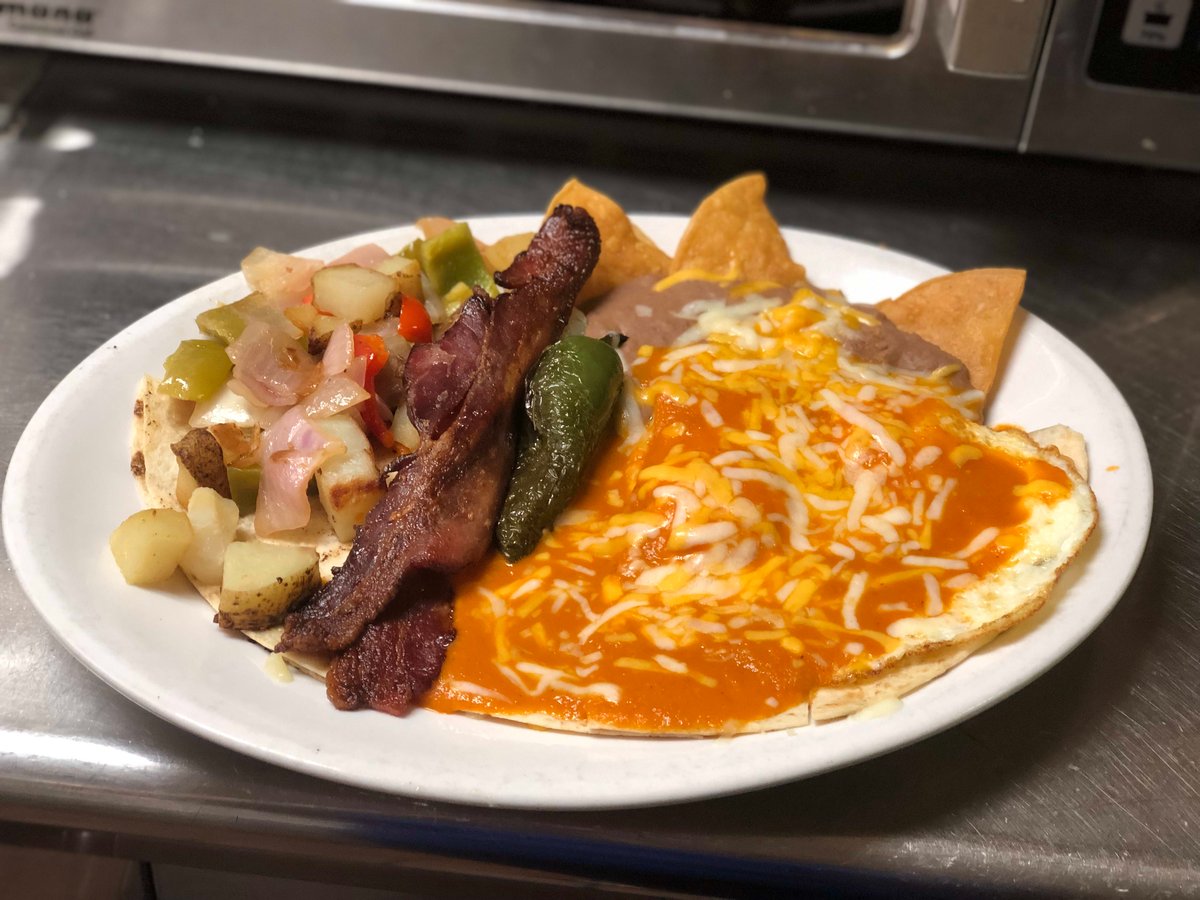 Quesadilla ranchero with basted eggs, and bacon