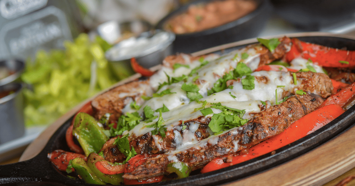 Sizzling Fajitas Loco Eats Loco Patrõn Mexican Restaurant in AZ