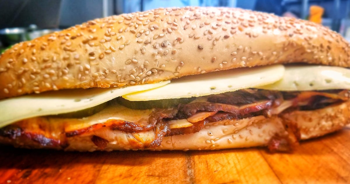 52. "Cuban Sandwich" Fresh Pork, Swiss Cheese, Pickles, Mustard & Mayo