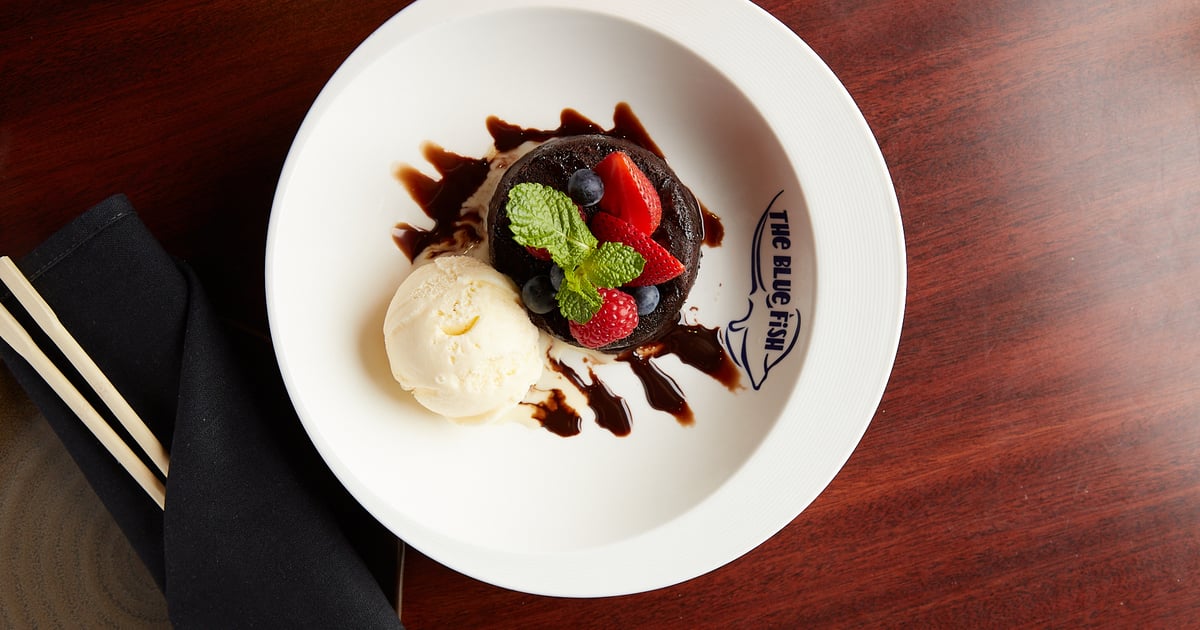 Chocolate Lava Cake with Berries and Ice Cream Menu The Blue Fish